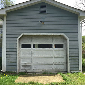 Deteriorating paint on garage door